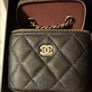 CHANEL Quilted Black Mini Bag with Gold Accents